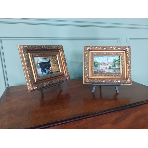 2122 - Pair of French oleographs mounted in gilt frames raised on table top easels {26 cm H x 31 cm D}.