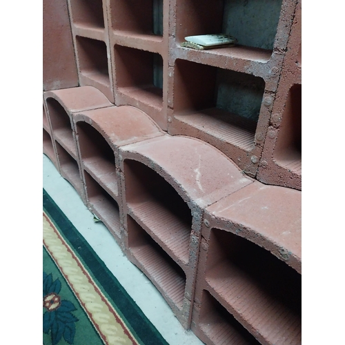 2123 - Set of three French terracotta stackable wine racks. (Each section is two shelves)