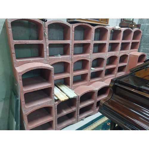 2123 - Set of three French terracotta stackable wine racks. (Each section is two shelves)