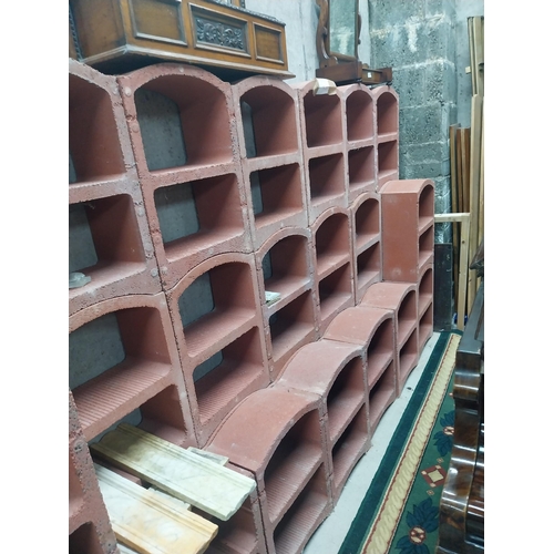 2123 - Set of three French terracotta stackable wine racks. (Each section is two shelves)