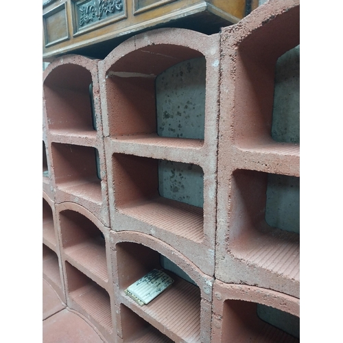 2123 - Set of three French terracotta stackable wine racks. (Each section is two shelves)