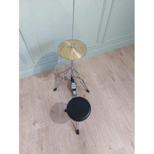 2066 - Cymbal with stool {113 cm H x 57 cm W x 53 cm D and 36 cm H x 34 cm Dia.}.