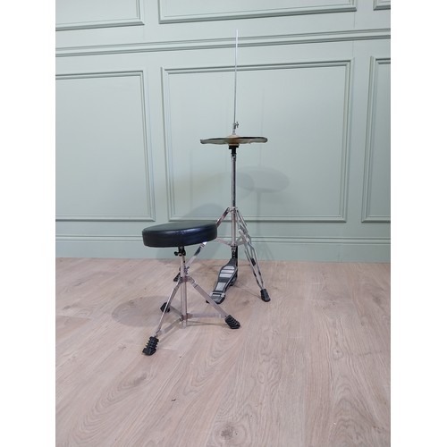 2066 - Cymbal with stool {113 cm H x 57 cm W x 53 cm D and 36 cm H x 34 cm Dia.}.