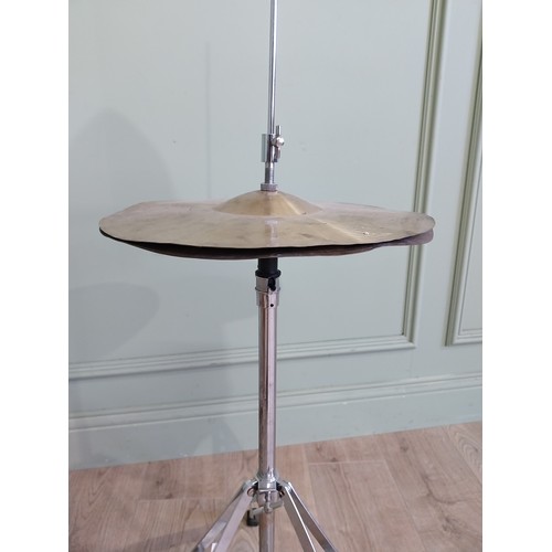 2066 - Cymbal with stool {113 cm H x 57 cm W x 53 cm D and 36 cm H x 34 cm Dia.}.