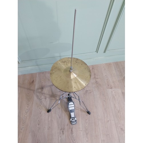 2066 - Cymbal with stool {113 cm H x 57 cm W x 53 cm D and 36 cm H x 34 cm Dia.}.