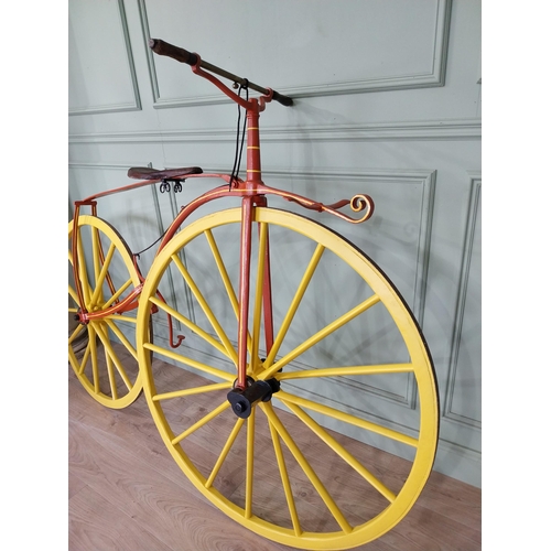 1274 - 19th C. wrought iron Bone shaker bicycle with timber spoke wheels {143 cm H x 200 cm W }.