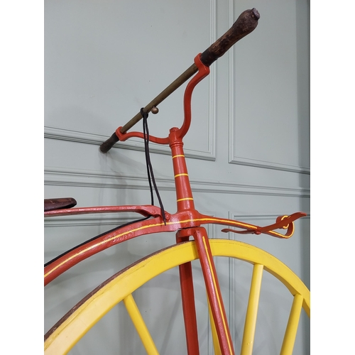 1274 - 19th C. wrought iron Bone shaker bicycle with timber spoke wheels {143 cm H x 200 cm W }.