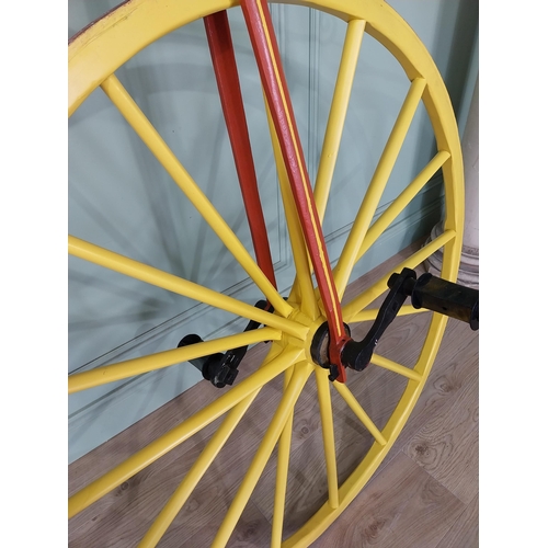 1274 - 19th C. wrought iron Bone shaker bicycle with timber spoke wheels {143 cm H x 200 cm W }.