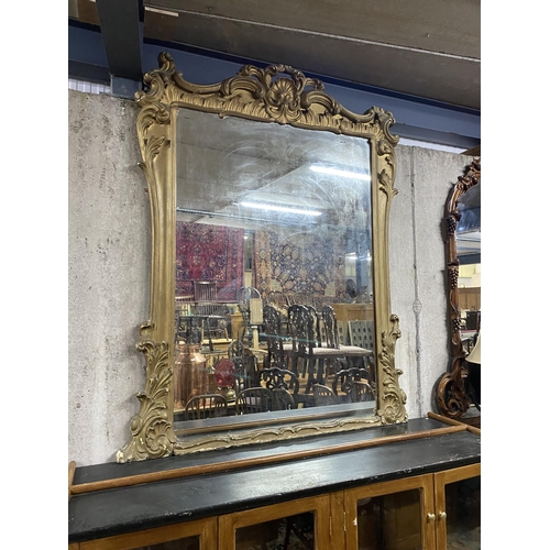 140 - William IV gilt overmantle mirror of large proportions {230 cm H x 185 cm W}.