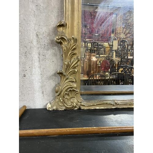 140 - William IV gilt overmantle mirror of large proportions {230 cm H x 185 cm W}.