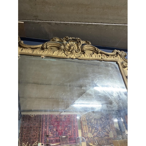 140 - William IV gilt overmantle mirror of large proportions {230 cm H x 185 cm W}.