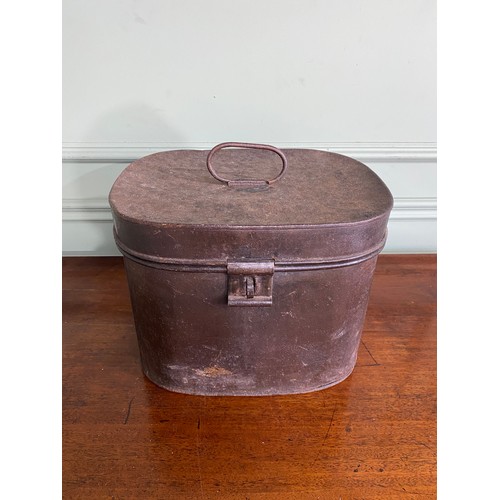 485 - 20th C. metal hat box with hat {30 cm H x 35 cm W x 29 cm D}.