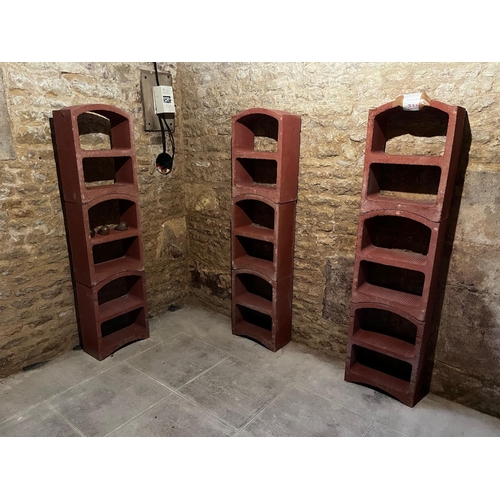 2125 - Set of three French terracotta stackable wine racks. (Each section is two shelves)