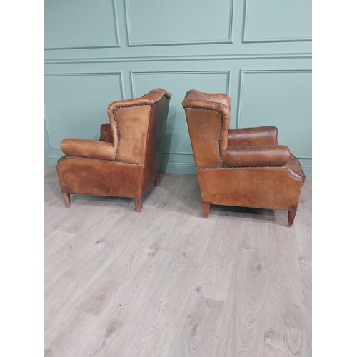 72 - Pair of French hand-dyed leather upholstered wingback armchairs raised on square tapered legs {93 cm... 