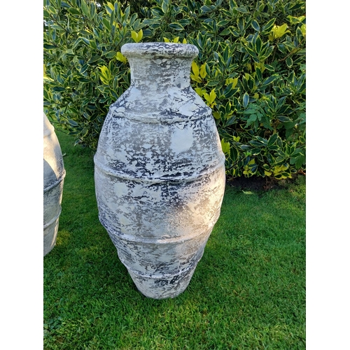 40 - Pair of glazed terracotta Atlantis urns. {68 cm H x 30 cm Dia.}.