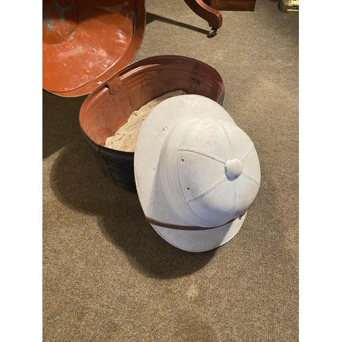 109 - Early 20th C. metal hat box with original safari hat {30cm  H  x 40cm W x 30cm D}.