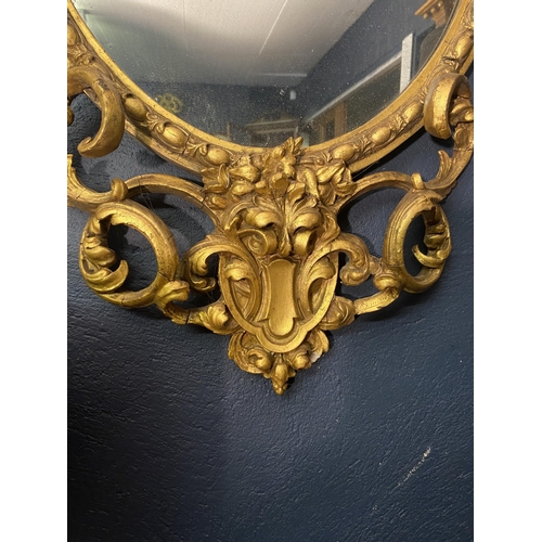 13 - 19th C. French giltwood oval wall mirror {101cm  H  x 51cm W}.