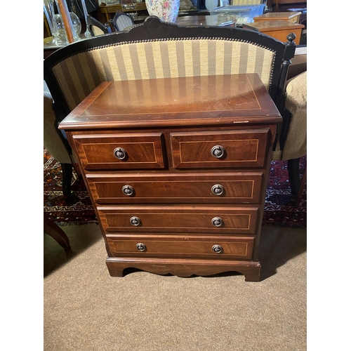 134 - Mahogany and satinwood inlaid bachelors chest with two short drawers over three long drawers raised ... 