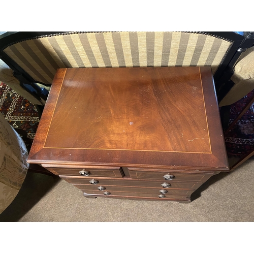 134 - Mahogany and satinwood inlaid bachelors chest with two short drawers over three long drawers raised ... 