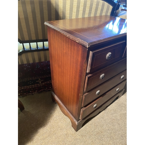 134 - Mahogany and satinwood inlaid bachelors chest with two short drawers over three long drawers raised ... 