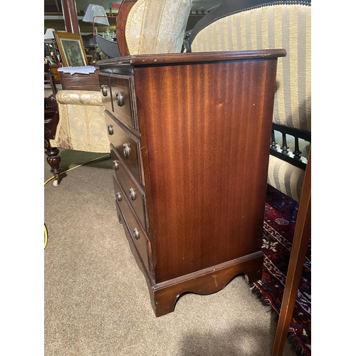 134 - Mahogany and satinwood inlaid bachelors chest with two short drawers over three long drawers raised ... 