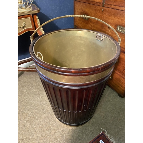 21 - Good quality Irish mahogany brass bound peat bucket in the Georgian manner {66cm  H  x 51cm W x 51cm... 