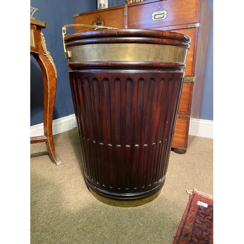 21 - Good quality Irish mahogany brass bound peat bucket in the Georgian manner {66cm  H  x 51cm W x 51cm... 