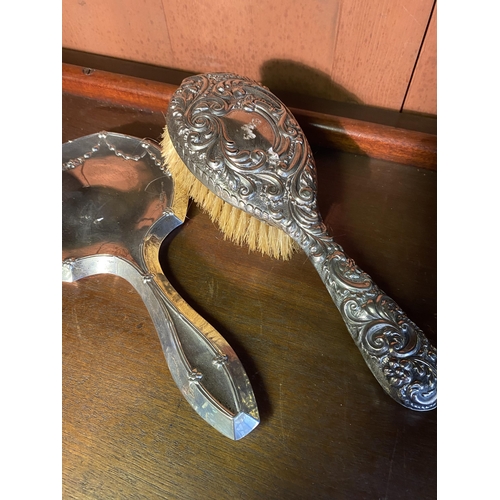 33 - Two 19th C. English silver vanity mirrors and brush.