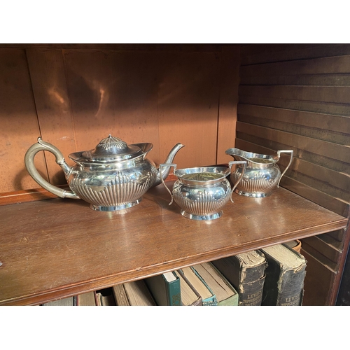 34 - English silver three piece tea set