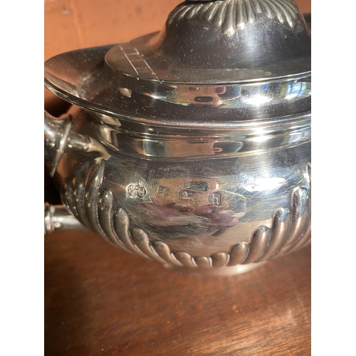 34 - English silver three piece tea set