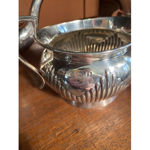 34 - English silver three piece tea set