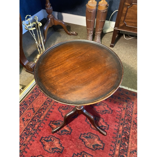 38 - Edwardian mahogany wine table raised on turned column and three outswept feet {63cm  H  x 43cm W x 4... 