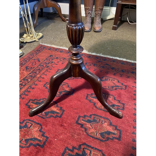 38 - Edwardian mahogany wine table raised on turned column and three outswept feet {63cm  H  x 43cm W x 4... 