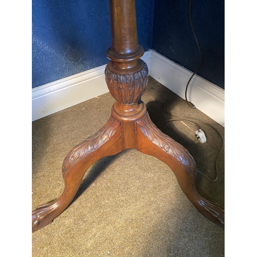 47 - 19th C. Irish mahogany pie crust centre table raised on turned column and three outswept feet {75cm ... 