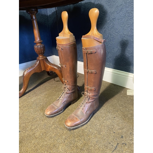 48 - Pair of early 20th C. leather riding boots with pine lasts {63cm  H  x 11cm W x 30cm D}.