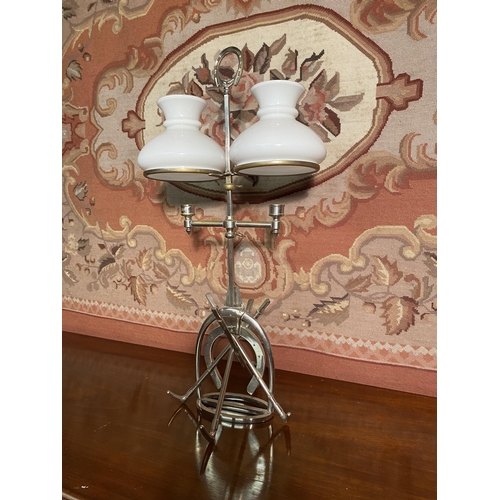 616A - Unusual 1920s silver plate candle holder with two opaline glass shades {66cm  H  x 35cm W x 28cm D}.