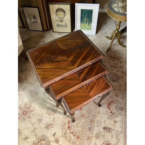 629 - Edwardian style mahogany nest of three tables with inset glass tops raised on cabriole legs {55cm  H... 