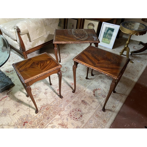 629 - Edwardian style mahogany nest of three tables with inset glass tops raised on cabriole legs {55cm  H... 