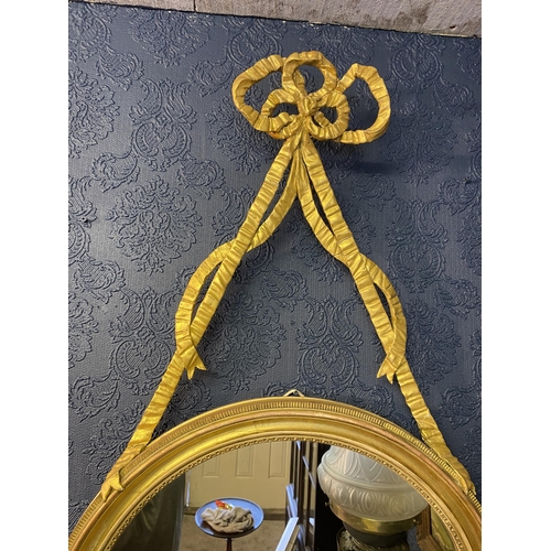 63 - Pair of good quality Regency giltwood pier mirrors decorated with bows and swags {107cm  H  x 60cm W... 