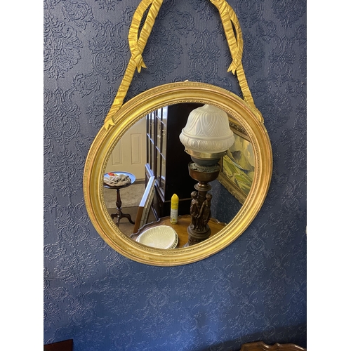 63 - Pair of good quality Regency giltwood pier mirrors decorated with bows and swags {107cm  H  x 60cm W... 