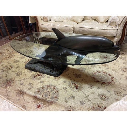 630A - Good quality bronze coffee table with glass top in the form of a Dolphin {60cm  H  x 153cm W x 90cm ... 