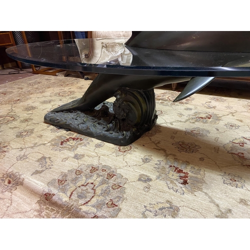 630A - Good quality bronze coffee table with glass top in the form of a Dolphin {60cm  H  x 153cm W x 90cm ... 