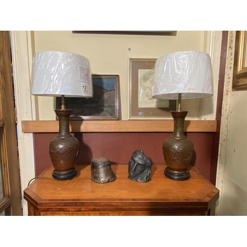 74 - Pair of early 19th C. Oriental bronze table lamps with cloth shades {63cm  H  x 29cm Dia.}.