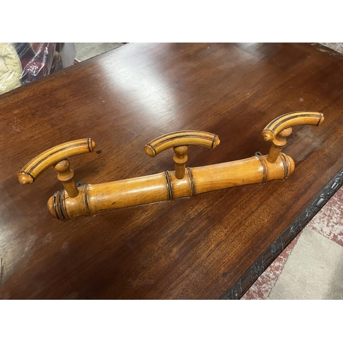 856 - Edwardian faux bamboo wall mounted coat hooks {8cm  H  x 50cm W x 45cm D}.