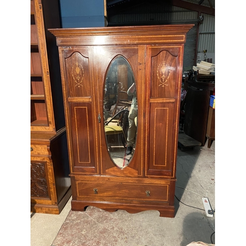 858 - Edwardian mahogany and satinwood inlaid wardrobe with mirrored door {202cm  H  x 127cm W x 51cm D}.