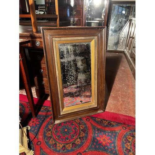 864 - Edwardian oak framed wall mirror {85cm  H  x 55cm W}.