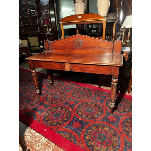 888 - 19th C. mahogany side table with gallery back raised on turned legs {104cm  H  x 133cm W x 53cm D}.