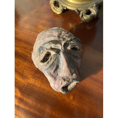 97 - Unusual glazed ceramic head in the manner of Salvador Dali {13cm  H  x 12cm W x 12cm D}.