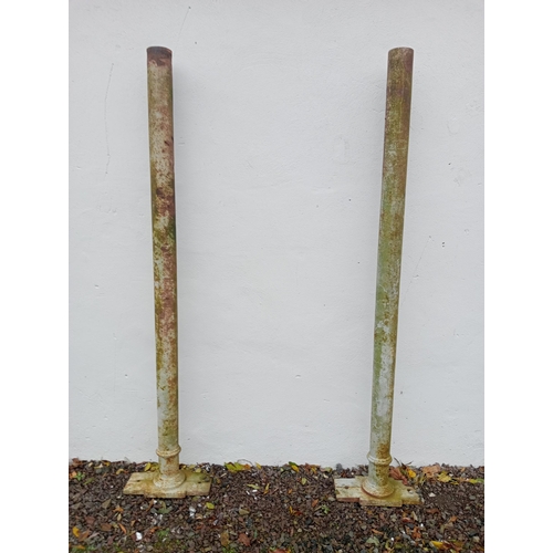 879 - Pair of cast iron columns {Base W 41cm x D 20cm H 202cm x Dia 10cm }.