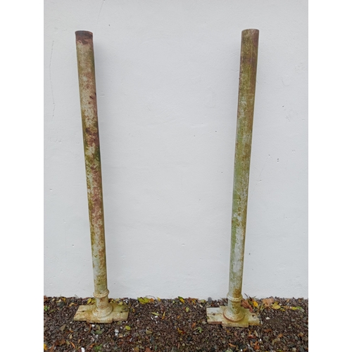 879A - Pair of cast iron columns {Base W 41cm x D 20cm x H 255cm x Dia 10cm }.